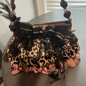 Mary Frances animal print embroidered ruffled small purse with beaded strap